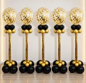 Gold confetti and streamer balloons